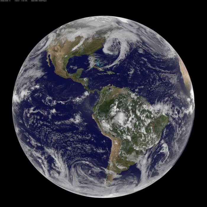 A great view from space of three large low pressure systems affecting North America yesterday, March 31. Courtesy of NASA.