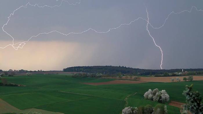 4-4-2014: Photogenic daytime lightning from scattered storms near Kraichgau, Germany. Source: Uwe Grün via tiwtter @Kraichgaufoto