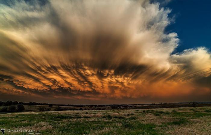 4-3-2014: Here is a spectacular colorful backside of a convective line across the NE Oklahoma. A view over the mammatus illuminated with sunset colors is just incredible!