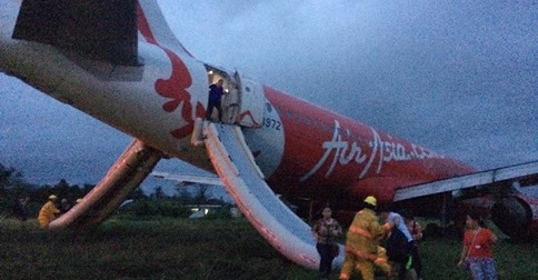 12-30-2014: A second AirAsia jet ran into trouble after it overshot a runway while landing in the Philippines on Tuesday, forcing those aboard to disembark by emergency slides, a passenger on the plane told NBC News. There were not believed to be any injuries from the hard landing of the AirAsia plane in Kalibo, on the Philippine island of Panay. "There was some turbulence but we didn't expect that landing," Jakata-based journalist Jet Damazo Santos, who was on board the flight, told NBC News. "I didn't even realize we overshot the runway until we saw grass outside the window." There were 159 passengers and crew aboard flight Z2272, Philippine officials told The Associated Press. The incident came hours after debris and bodies found in the Java Sea were confirmed to have come from AirAsia Flight QZ8501, which disappeared from radar on Sunday while flying from Indonesia to Singapore.