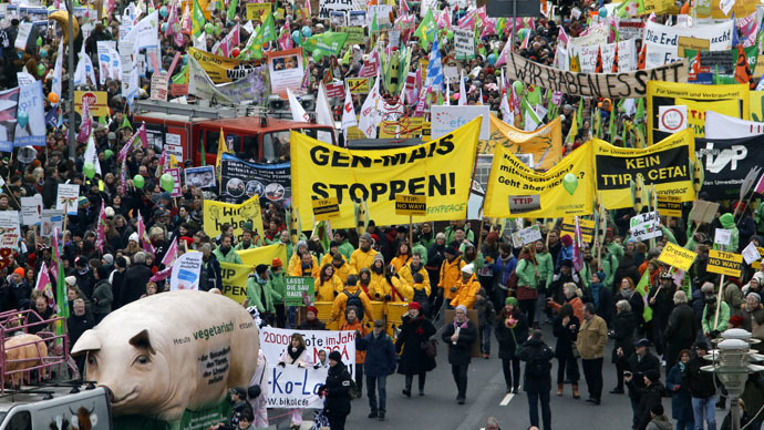 German farmers and consumer rights activists take part in a march to protest against the Transatlantic Trade and Investment Partnership (TTIP), mass husbandry and genetic engineering in Berlin, January 17, 2015. (Reuters/Fabrizio Bensch)